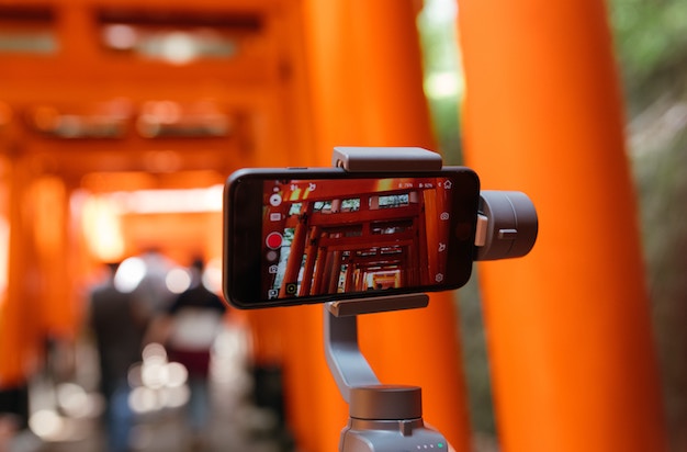 phone in a tripod recording video